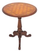 A Victorian walnut, stained beech and inlaid circular occasional table, the top decorated for chess,
