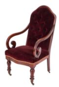 A Regency mahogany button-back upholstered open elbow chair, circa 1815,