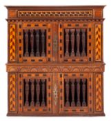 A George V walnut and parquetry cupboard in 17th century taste,