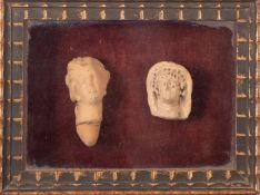 Two Helenistic pottery female heads, probably 3rd century B.C.