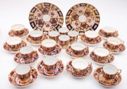 A matched early 19th century and later English Imari pattern porcelain part tea and coffee service