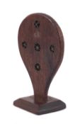 A 19th Century treen straw splitter, of inverted pear shape, on a square bevelled plinth.