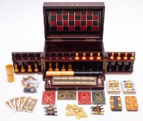 A Victorian mahogany games compendium,