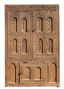 A Jacobean carved oak linen cupboard,