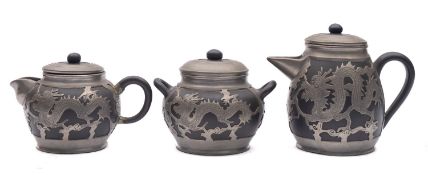 A Chinese Yixing pewter mounted three piece tea service,