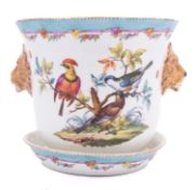 A Meissen [outside decorated] cache pot and stand with lion mask handles,