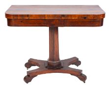 A Victorian rosewood rectangular card table, the baize lined hinged top with rounded corners,