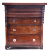 A Victorian miniature mahogany chest of drawers, inscribed E.