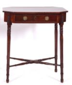 A Regency mahogany and inlaid octagonal work table, with a crossbanded and ebony strung top,