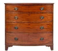 A Regency mahogany bowfront chest of drawers, early 19th century; the top with reeded edges,