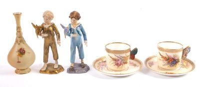 A group of Royal Worcester porcelain, comprising two Freda Doughty figures,