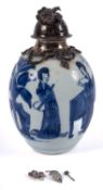 A Chinese blue and white silver-mounted tea caddy and cover the ovoid body painted with four