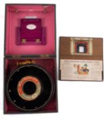 The Praxinoscope-Theatre New Optical Toy, contained in original box, 24.5cm x 26.5cm x 13cm.