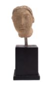 A Helenistic sculpted terracotta model of a male head, probably 3rd-2nd century B.C.