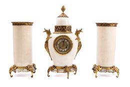 A white pottery French three-piece clock garniture the eight-day duration movement striking the