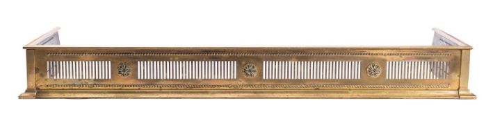 An Edwardian brass fender, early 20th century; of rectangular form,