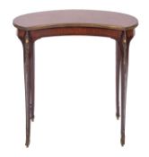 A late 19th/ early 20th century French kingwood, parquetry and gilt metal mounted Gueridon,