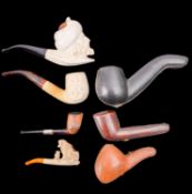 Four Austrian meerschaum pipes,