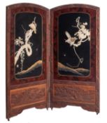 A Japanese carved, lacquered, bone and mother-of-pearl inset two-fold screen,