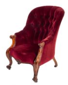 A Victorian carved rosewood armchair, with upholstered stuff over button down back,