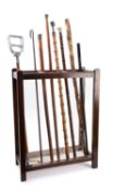 A group of eight various walking sticks,
