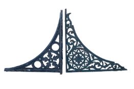 A group of cast and wrought iron architectural wall brackets and other elements,