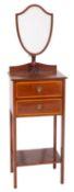 An Edwardian mahogany washstand,