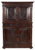 A Dutch carved oak Hallenschrank, in 17th century style,
