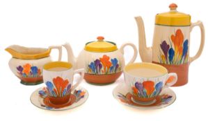 A group of Clarice Cliff Bizarre tea and coffee wares decorated in the 'Crocus' pattern,