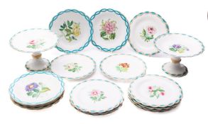 An English porcelain dessert service comprising two tall comports and sixteen plates,