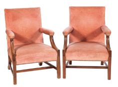 A pair of elm, beech and upholstered Gainsborough armchairs in George III style,