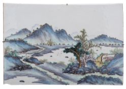 A pair of Chinese famille verte porcelain rectangular plaques painted with extensive mountainous