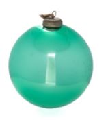 A large green glass witch ball, 24cm diameter.