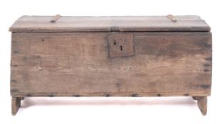 A 17th Century oak rectangular coffer, of plank construction,