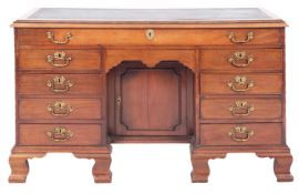 A Victorian mahogany desk in George II style,