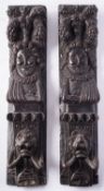 A pair of Elizabethan carved oak herm figures, early 17th century; modelled as opposing,