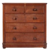 A Victorian mahogany chest of drawers, circa 1870; the top with moulded edges,