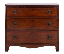 A Regency mahogany bowfront chest of drawers, early 19th century; the top with reeded edges,