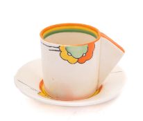 A Clarice Cliff Bizarre conical coffee can and saucer decorated in the 'Nemesia' pattern,