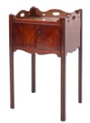 A George III mahogany tray top bedside cupboard,