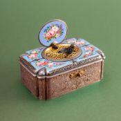 A Swiss gilt white metal and enamel cased singing bird automaton music box,