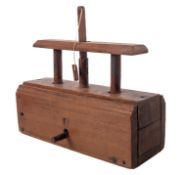 A Victorian wooden mousetrap, of rectangular form, with rising block, 30cm long.