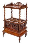 A Victorian walnut canterbury whatnot,
