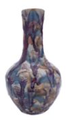 A Chinese bottle vase decorated overall with splashes of blue,