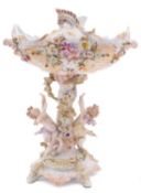 A Sitzendorf centrepiece painted and applied with flowers and foliage,