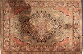 A machine made 'Templeton Abbey' carpet of Persian pattern,