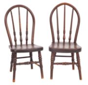A near matching pair of 19th Century elm and beech stick back Windsor child's chairs,