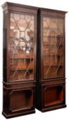A pair of George III mahogany and glazed bookcases,