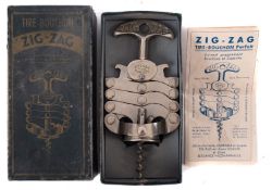 A French polished steel zig-zag corkscrew, inscribed 'Bte SGDG Fr & Et M & M Dep,