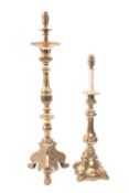 A metal table lamp modelled as a 17th century altar stick,